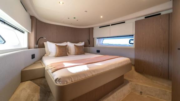 In Sibenik motor yacht charter option Nalu cabin with comfortable bed and modern interior offering relaxing stay visible