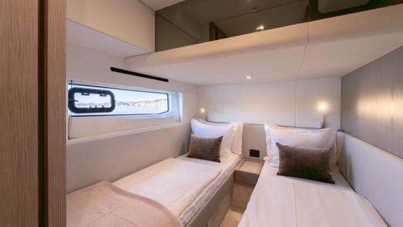 In Sibenik motor yacht charter option Nalu twin cabin with two beds and modern design offering comfortable stay experien