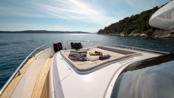 Bow sunbathing area of the Azimut Magellano 66 Ava 2 motor yacht off the coast of Split, Croatia.