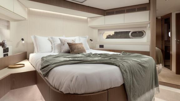 Master cabin of the Azimut Magellano 66 Ava 2 motor yacht off Split, Croatia, offering comfortable stays at sea.