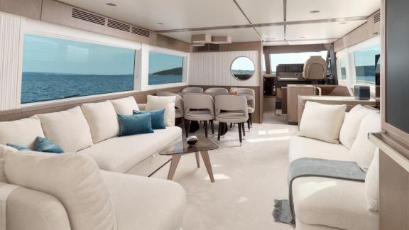 Saloon of the Azimut Magellano 66 Ava 2 motor yacht off Split, Croatia, offering comfortable living spaces at sea.