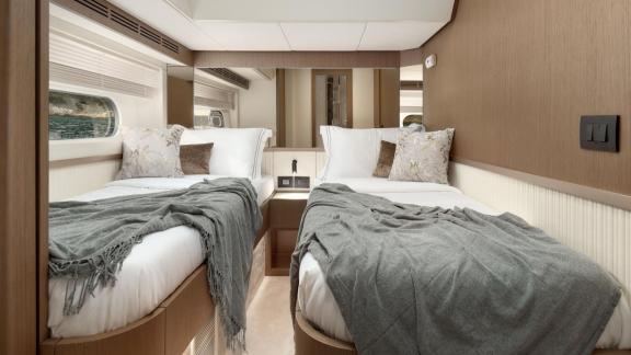 Twin cabin of the Azimut Magellano 66 Ava 2 motor yacht off Split, Croatia, offering comfortable guest accommodation.