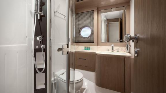 Bathroom with shower on the Azimut Magellano 66 Ava 2 motor yacht off Split, Croatia, offering onboard comfort.