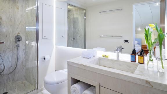 Modern bathroom of the 30-meter Motor Yacht Martina, equipped with luxurious amenities in Greece.