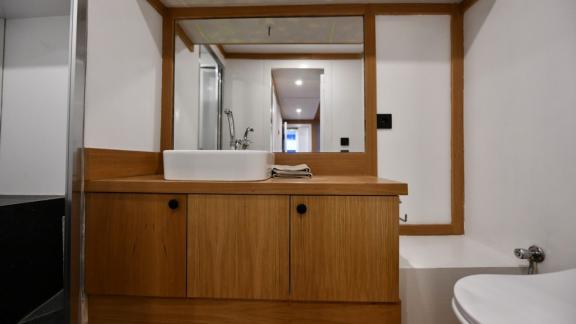 The modern bathroom of Gulet Nayk 2 offers comfort and style with high-quality fixtures.