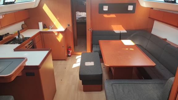 The saloon of the Seawalker yacht, with its spacious seating area and modern kitchen, is perfect for a relaxing vacation