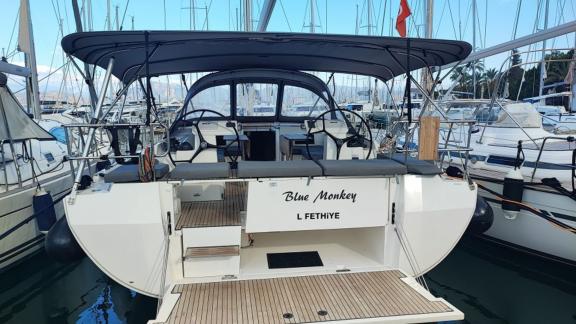 Aft deck of the sailing yacht Blue Monkey with comfortable seating areas.