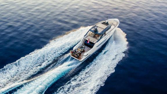Kimani Bluegame BG74 showcases an elegant deck layout while cruising gracefully on the water.