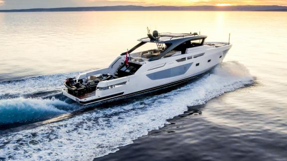Motor yacht Kimani Bluegame BG74 glides through Split waters at sunset with refined design and performance.