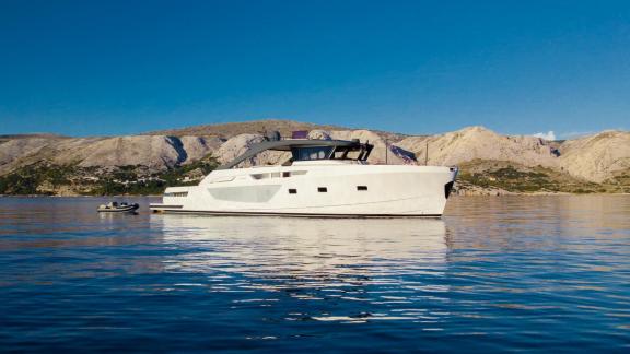Motor yacht Kimani Bluegame BG74 glides gracefully on the Adriatic, showcasing style and performance in one vessel.