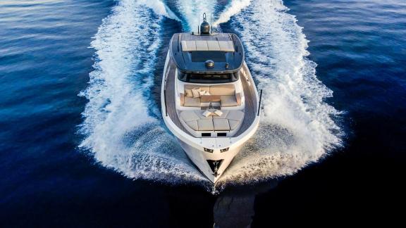 Motor yacht Kimani Bluegame BG74 demonstrates impressive performance while cutting through the water.
