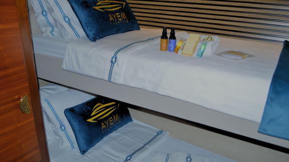 Ayem’s bunk cabin offers a smart family-friendly layout for your Göcek yacht charter.