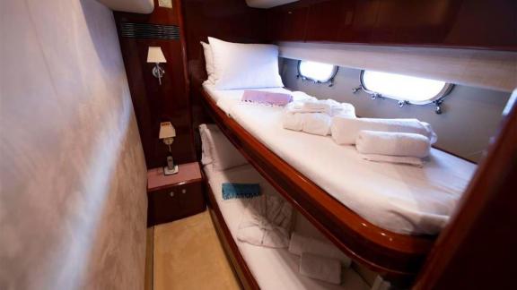 Experience comfort in the bunk bed cabin of motor yacht Bormus 2.