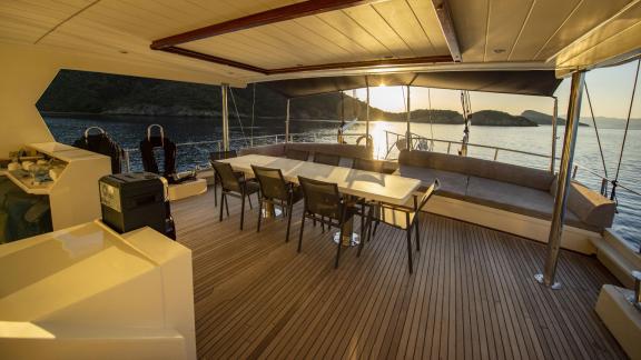 The inviting deck area of the Gulet Buse with 5 cabins in the morning light.