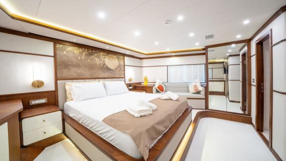 Bright and elegantly designed master cabin for a refined yacht rental in Fethiye.