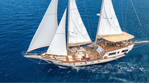 The 22 meter Gulet Castiel sailing over the crystal-clear waters off the coast of Bodrum.