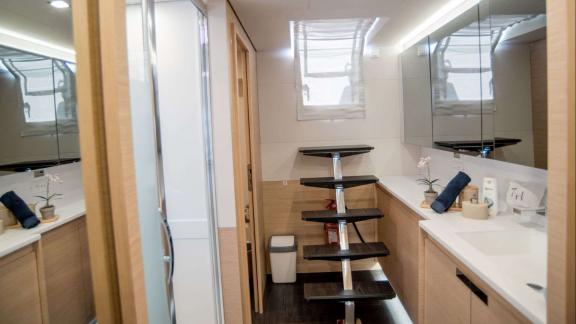 Stylish bathroom with modern details offering comfort on the 7th Heaven catamaran.