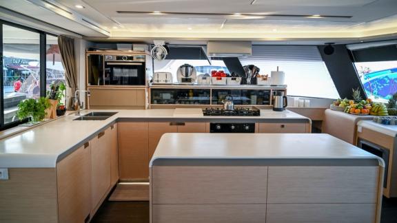 Fully equipped and stylish kitchen on the 7th Heaven catamaran in Athens.