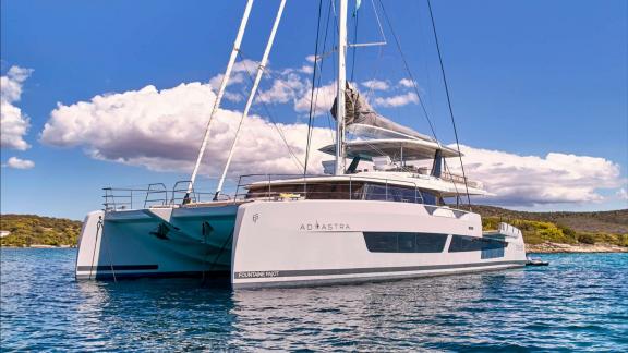 Ad Astra Catamaran Anchored Near Lavrion in Sunlight