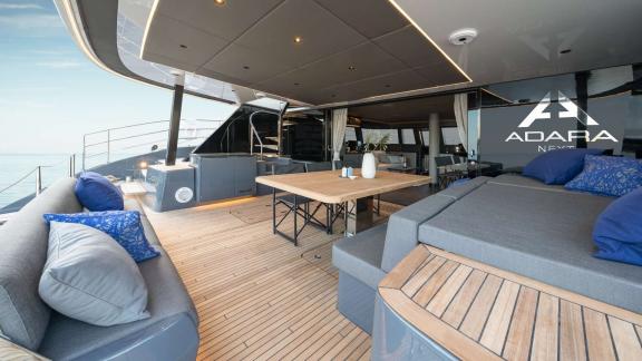 Enjoy the sea view from the spacious aft deck of the Adara Next catamaran, departing from Athens.