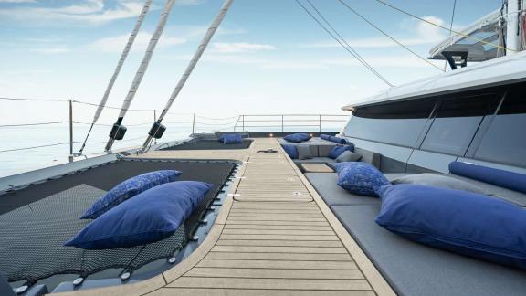 Enjoy the sea on the Adara Next catamaran’s comfy foredeck with blue cushions, departing from Athens.