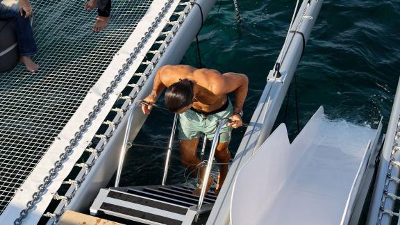 Refreshing swim during a Greece day tour aboard a catamaran departing from Athens.