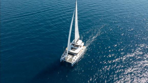 The sailing catamaran Artisan glides across Adriatic waters, available for charter from Split.