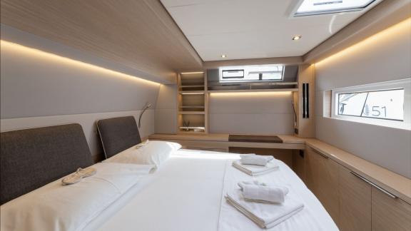 Artisan Lagoon 55’s master cabin offers bright, stylish comfort with natural lighting.