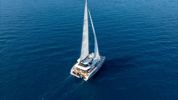 The luxury catamaran Artisan sails through Adriatic waters, offering a charter escape from Split.