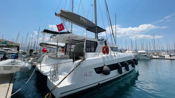 Stylish Bali 4.2 Catamaran Bella II, ready to set sail in the picturesque harbor of Marmaris.