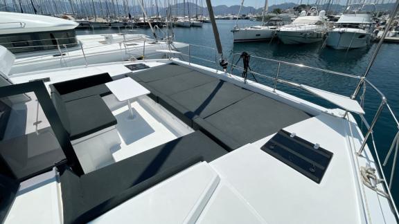 Relaxing sun deck of Bali 4.2 Catamaran Bella II overlooking the marina in Marmaris.