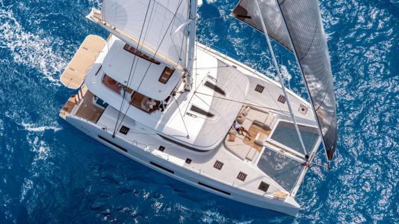 Top view of Catamaran Happy sailing, offering an elegant and powerful presence.