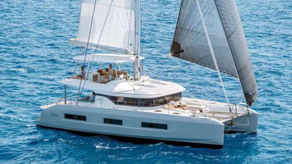 Catamaran Happy offers a comfortable sail on the open sea with its spacious deck.