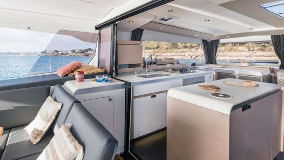 The catamaran Kebisiks features a sea-view kitchen and salon near Athens.