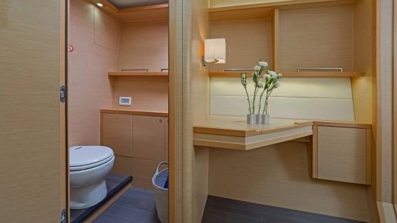 Elegant bathroom with a separate vanity area on Lagoon 560 S2 Meliti, modern and functional