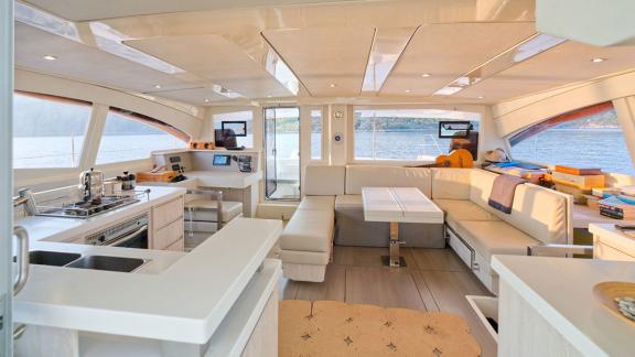 Stylish and spacious saloon of the Leopard 48 Monaco with panoramic views, perfect for luxurious cruises