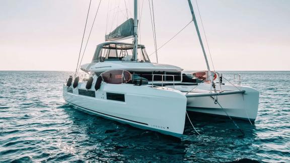 The Oneida 2 catamaran impresses with its spacious deck and stylish design while floating on the water.