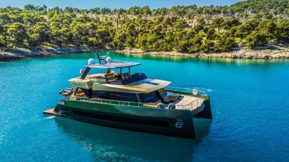 The luxury Moon 60 Over the Moon catamaran is available for charter in the turquoise bays of Split.