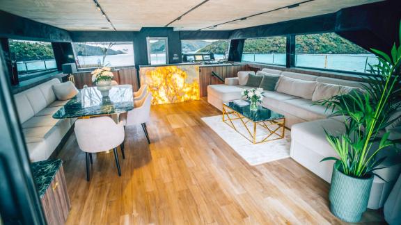 Surrounded by panoramic views and designer decor, this salon offers luxurious charter living in Split.
