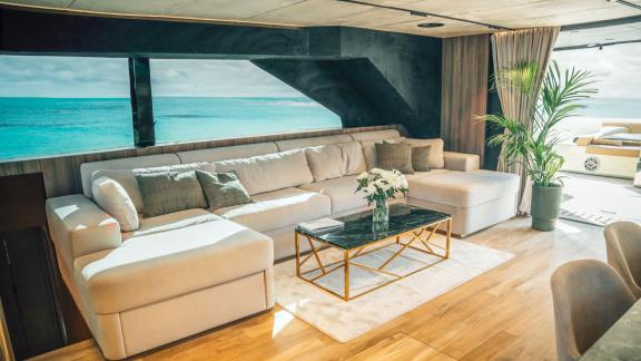 With a large sofa and soft light, the salon offers a peaceful charter experience off the coast of Split.