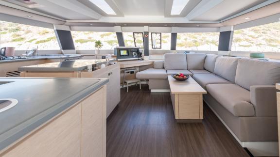 Spacious salon on the catamaran Pi 2 in Athens with an elegant seating area and modern amenities.