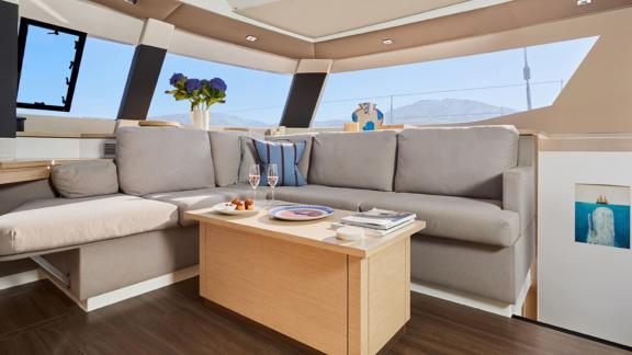 Elegant living area on the catamaran Pi 2 in Athens, perfect for relaxing moments with a glass of wine.