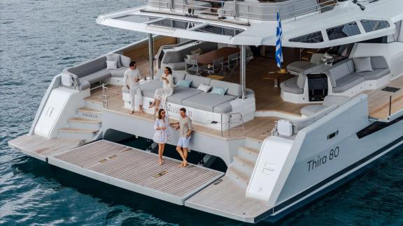 Fountaine Pajot 80 Serenissima III features a large swim platform and social lounge areas for a premium charter experien