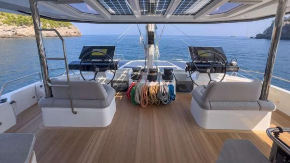 Fountaine Pajot 80 Serenissima III features dual helm stations and panoramic visibility for comfortable sailing.