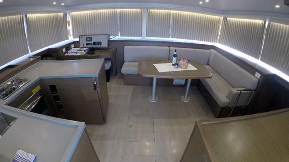 Spacious interior with a cozy seating area and modern amenities on Zuzo 2.