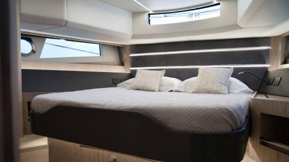 Among Saint Tropez yacht charter options Pegase motor yacht shows cabin with spacious double bed and comfort.