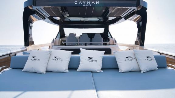 Among Saint Tropez yacht charter options Pegase motor yacht shows aft deck with sunbed and relaxing seating.