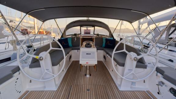 The cockpit of the Beluga 1 yacht features two helms and seating areas.
