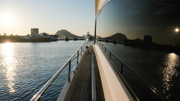 Side deck of a motor yacht during sunset