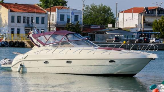 The motor yacht Blondie is anchored at Mykonos port, ready to welcome guests.